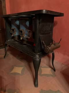 old antique stove heater 0