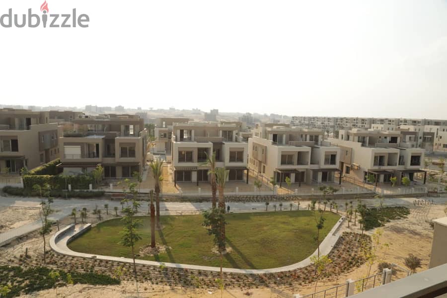 Exclusive twin house 296 sqm +88 sqm roof semi-finished View Landscape for sale in Palm Hills Compound, Fifth Settlement 11