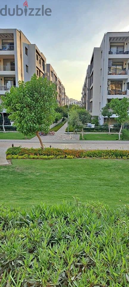 Apartment for sale in very special installments on the landscape in front of the airport in the Taj City compound 6