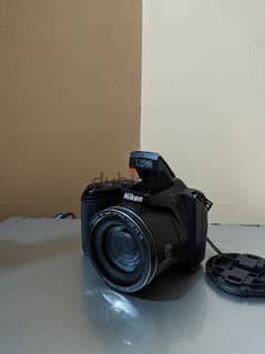 كاميرا Nikonl320