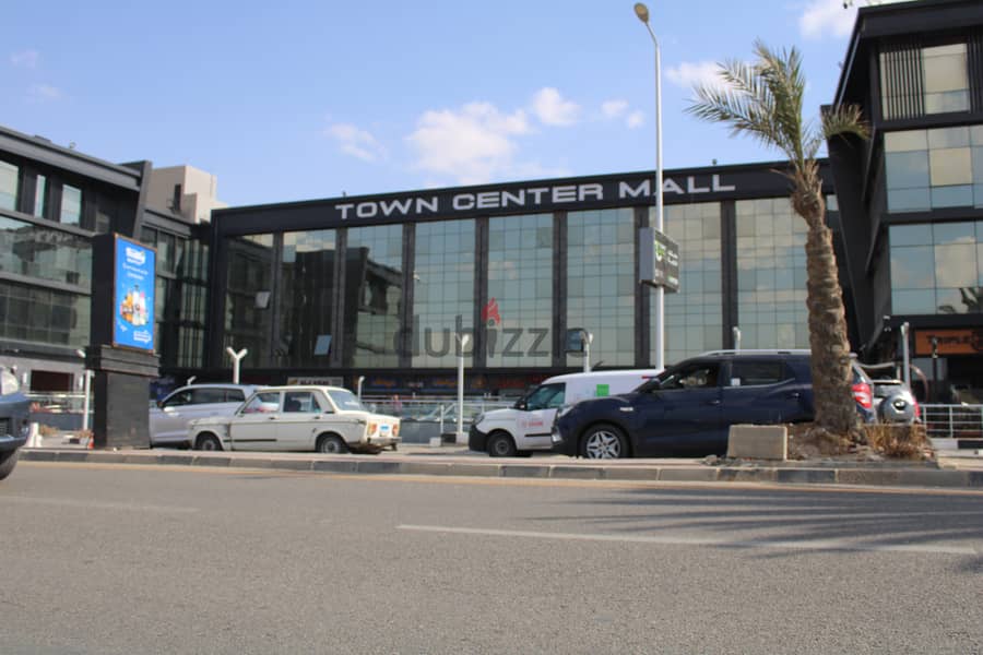 A commercial store in Town Center Mall in front of Green Hills Club 4