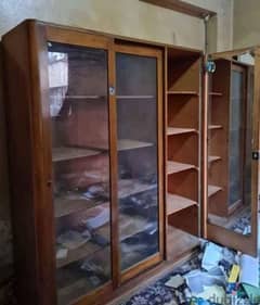 مكتبة خشبية ١. ٥*١. ٥ متر خشب طبيعي و ارفف خشبية و ضلفة زجاج 0