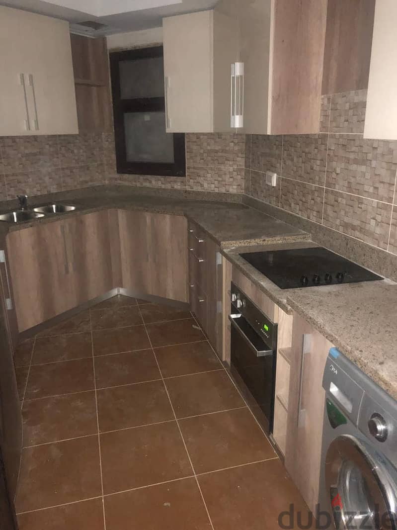Apartment for rent in mivida new cairo fully finished with kitchen and AC with garden 130m شقة للايجار فى ميفيدا التجمع الخامس 3
