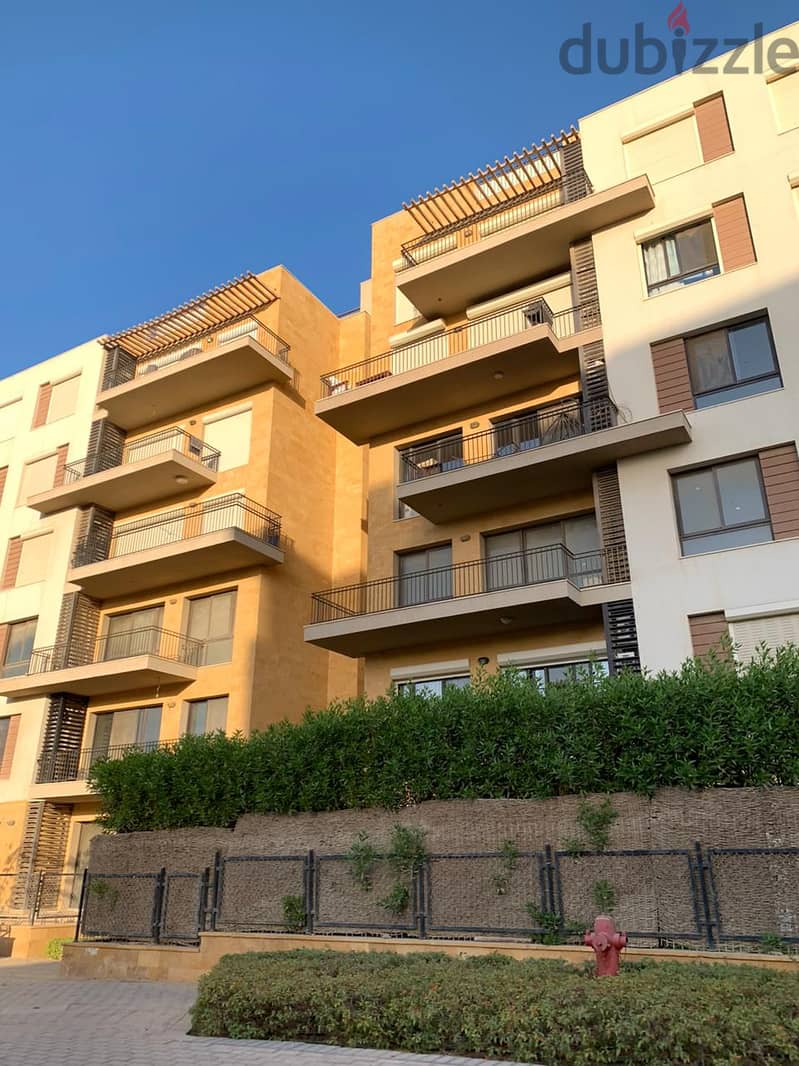 Apartment with garden for sale in Eastown - New Cairo 6