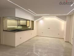 Ground floor apartment with garden for sale in the 7th District (Sheikh Zayed)