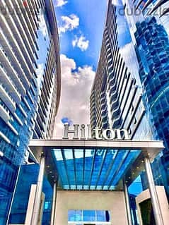شقة سمارت 415م للبيع إستلام فوري Hilton services أمام النيل أمام جزيرة الذهب في أبراج نايل تاورز Nile Towers 1