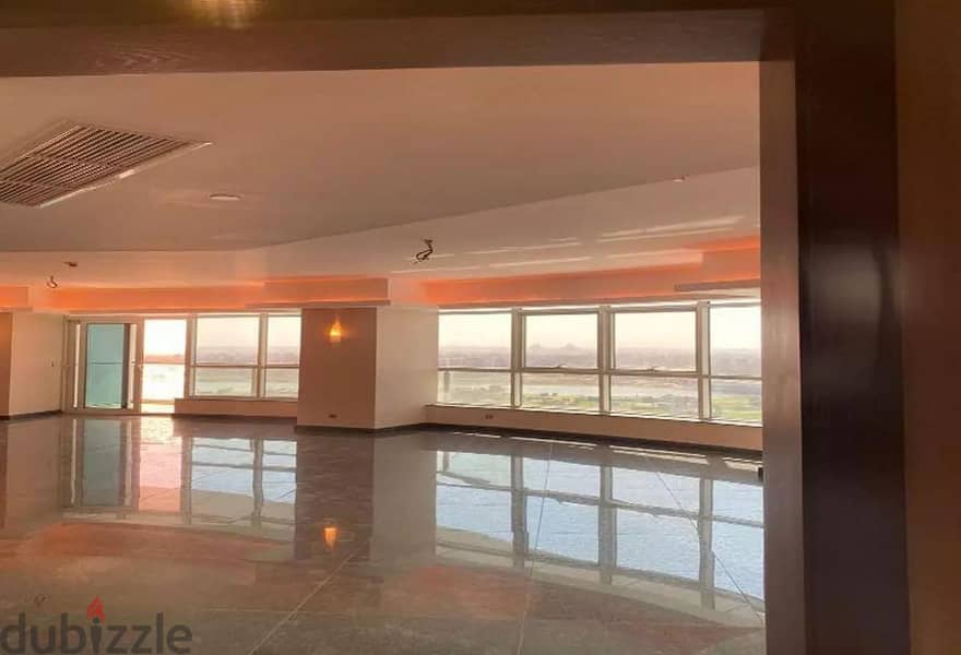 Smart apartment 415 sqm for sale, immediate receipt, Hilton services, in front of the Nile, in front of Gold Island, in Nile Towers 2