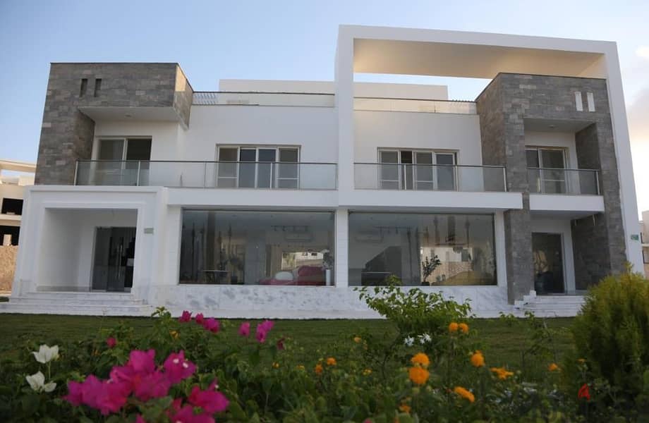 Distinctive chalet with view for sale in the most prestigious villages on the coast, “Sea View”, with a 10% down payment 1