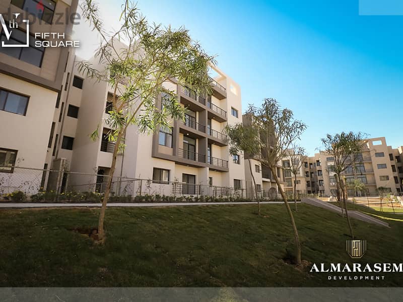 Own your immediate 3-bedrooms apartment in New Cairo in Fifth Square Compound In installments over the longest payment plan View on the landscape 4