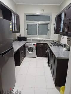 Ultra super lux fully furnished studio for rent in Village Gate Compound, next to the American University, New Cairo 0
