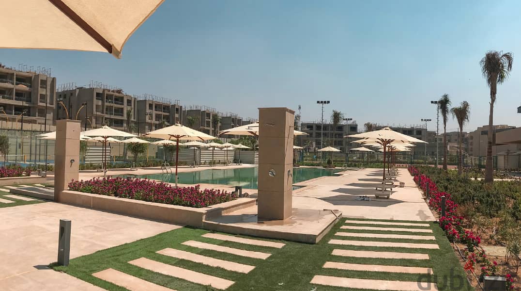 Apartment with garden, 155 sqm corner with sea view in Al Marasem Compound with imaginative finishing in the heart of Golden Square New Cairo 9