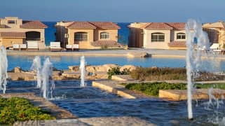 Twin house villa for sale, first row on the sea, in Telal Ain Sokhna Resort, next to Porto