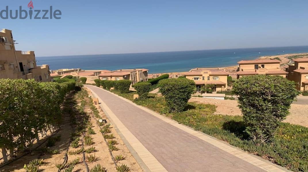 Twin house villa for sale, first row on the sea, in Telal Ain Sokhna Resort, next to Porto 7