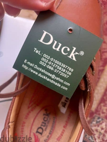 حذاء duckجلد طبيعي اصلي الاتنين بسعر واحده ف التوكيل بالضمان والكرتونه 17