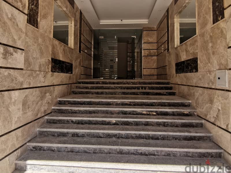 An apartment 240m for sale in Al Bostan st from the direct owner, Just steps away from Hyper One and The Mehwar 8