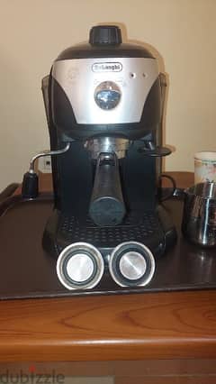 ماكينه للقهوة و الاسبريسو ديلونجي