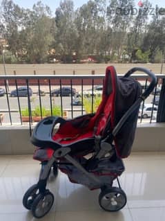 stroller junior color red in very good condition 0