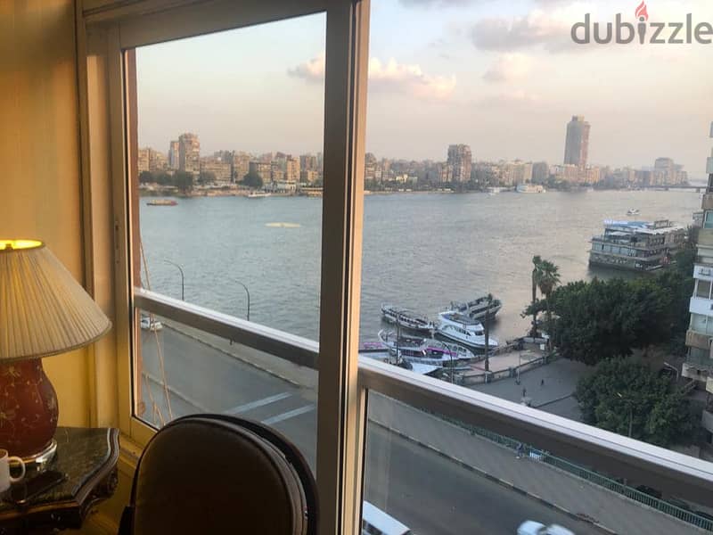 For sale, an apartment in Hilton Towers, fully finished, with air conditioners, immediate receipt, first row on the Nile 4
