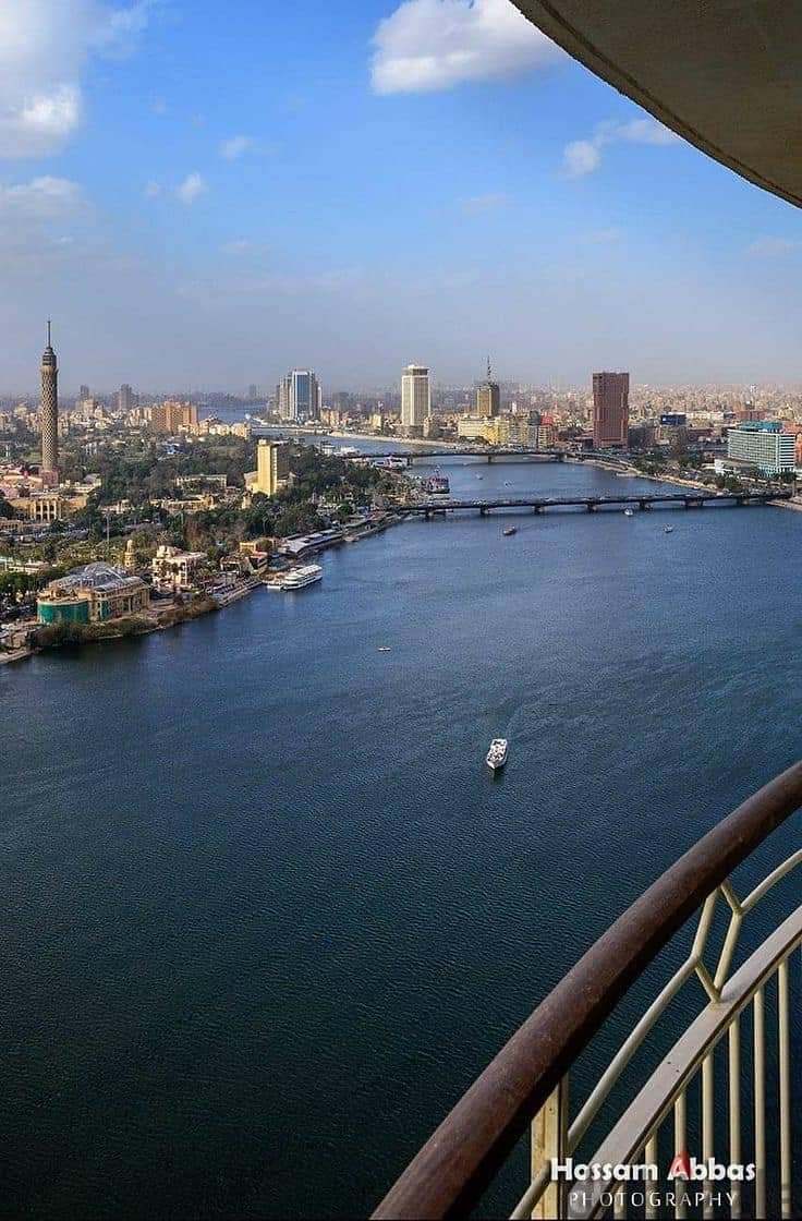 For sale, an apartment in Hilton Towers, fully finished, with air conditioners, immediate receipt, first row on the Nile 7