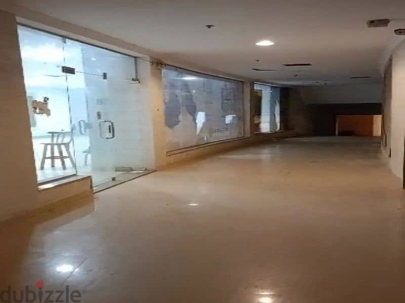 Shop for rent 123m on the main Mohamed Naguib axis 7