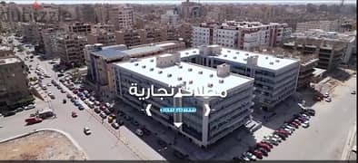A store directly on the front of the mall for sale in Nasr City, next to Mostafa Al-Nahhas Street and Al-Ahly Club, immediate delivery and installment