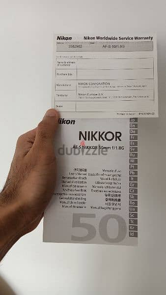 عدسة Nikkor 50mm automatic 3