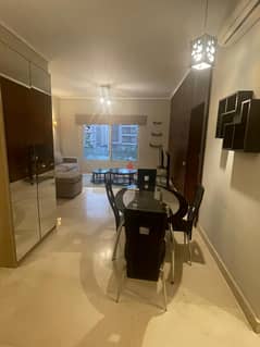 Fully-furnished studio for rent ultra super lux in prime location -The Village , 5th Settlement , New Cairo