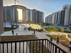 3-bedroom apartment, finished, with air conditioners and kitchen cabinets, for sale in the first towers in the Fifth Settlement, minutes from the AUC