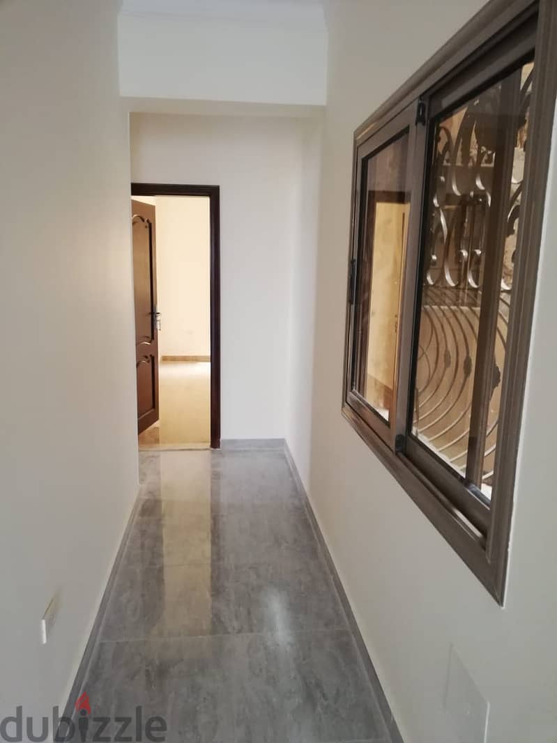 Apartment for sale in Al-Mousshoureen Compound, near Mohamed Naguib Axis, the American University, and Future University  Finishing: Super Lux 2