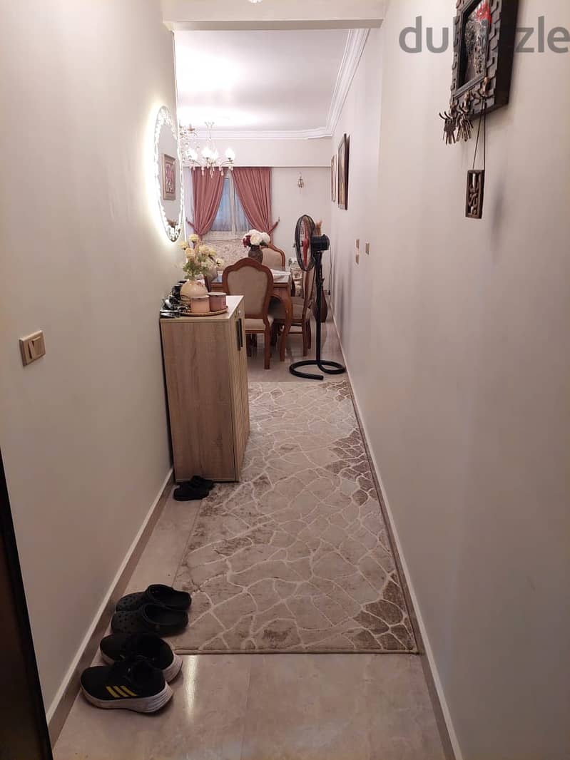 Apartment for sale with kitchen in the third settlement, Nozha Buildings, directly behind Katameya Heights Compound  On a main street  Nautical 2