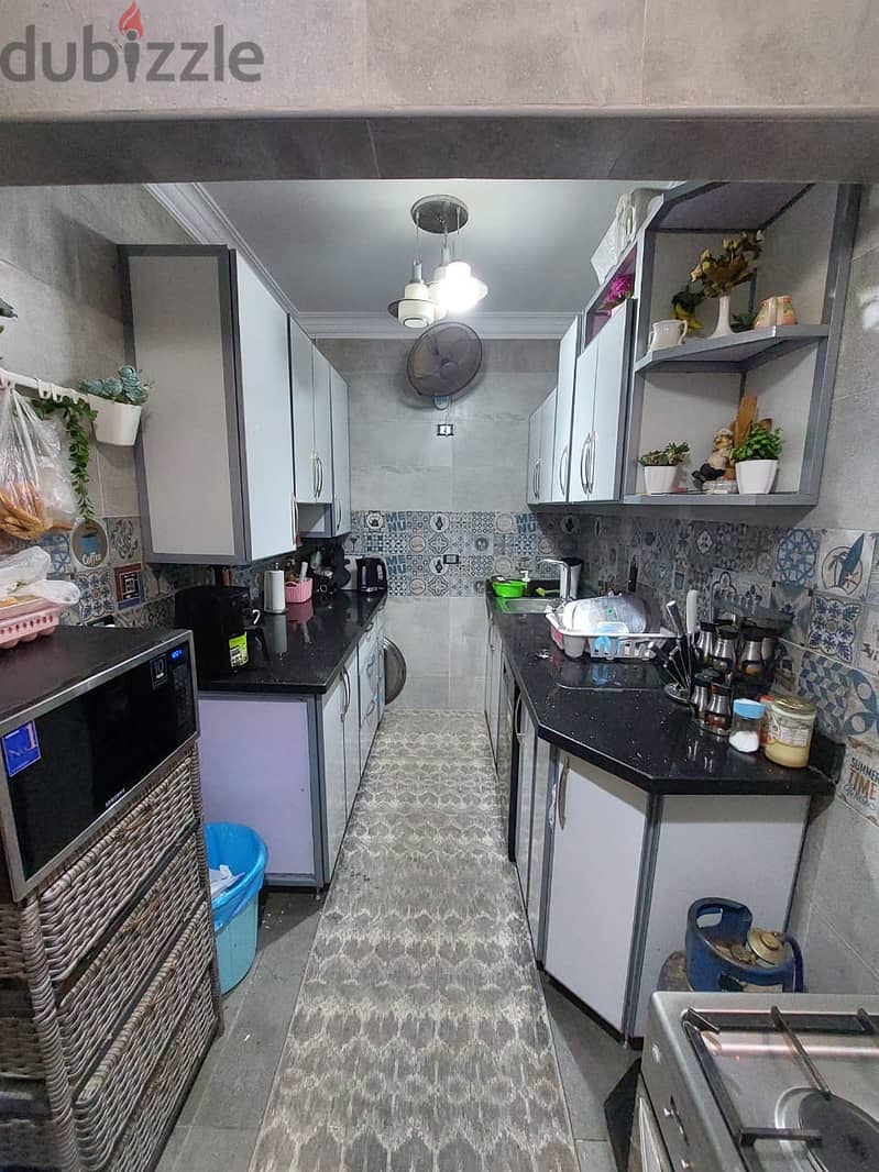 Apartment for sale with kitchen in the third settlement, Nozha Buildings, directly behind Katameya Heights Compound  On a main street  Nautical 7