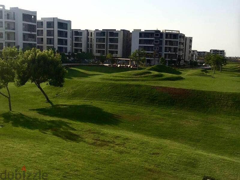 Apartment for sale in Taj City gate direct on Suez road in front of Airport 800,000 dp installments up to 8 year 1