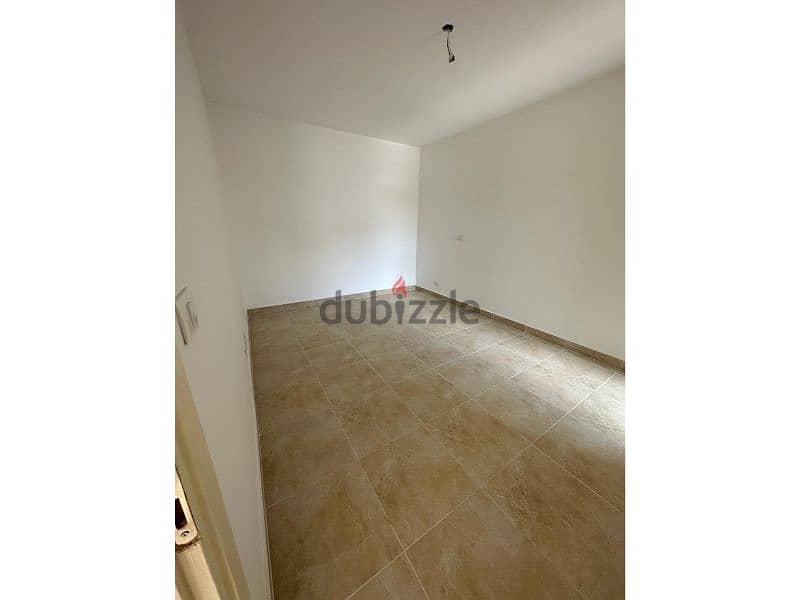 "Seize the opportunity and own your apartment in Madinaty, 109 square meters, with an old contract in B14. " 3