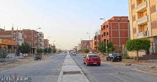 ارض في الامتداد بـ مدينة بدرعلي الرئيسي الفاصل تاني نمرة من الخدمات 0