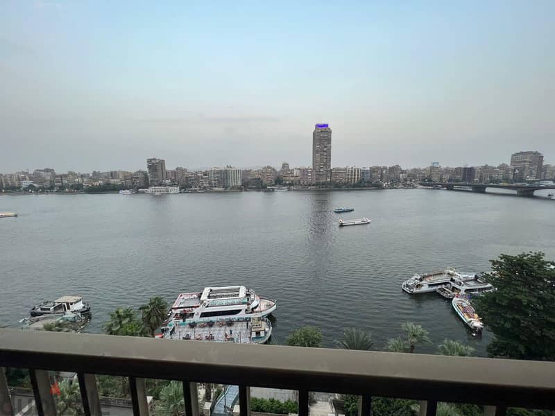 For sale, an apartment with immediate receipt, fully finished, in the heart of the Nile, first row on the Nile, in front of the tourist walkway, in in 4
