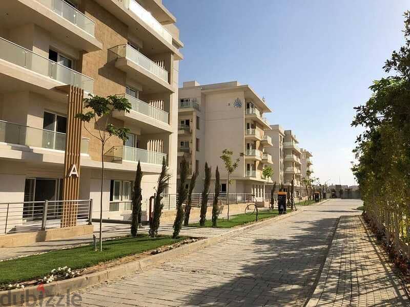 2BR Apartment for sale ground floor + garden (fully finished) on view - Minutes from Mall of Egypt  in Smart Compound - Badya palm Hills - 6 October 7