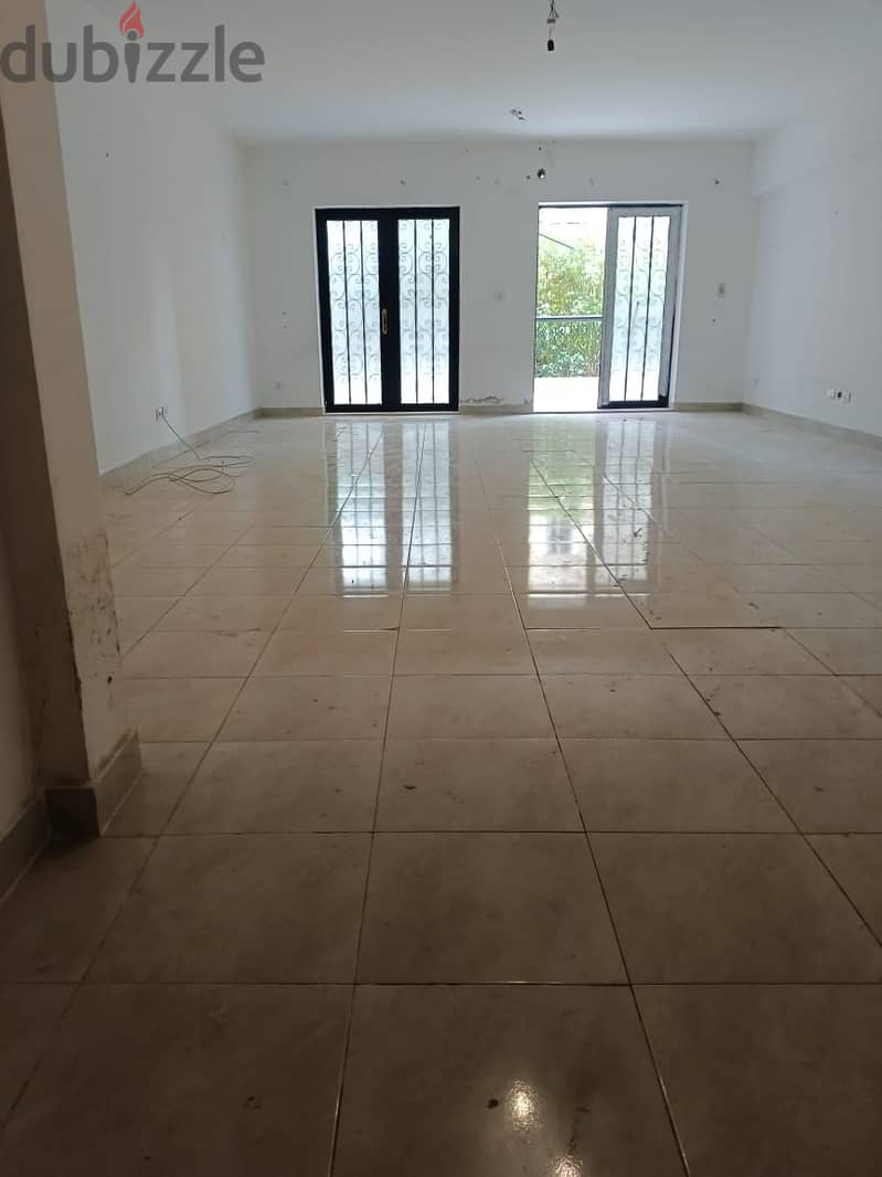 appartment avaliable for rent in el rehab at seventh phase ground floor with garden 180+50 meter 3