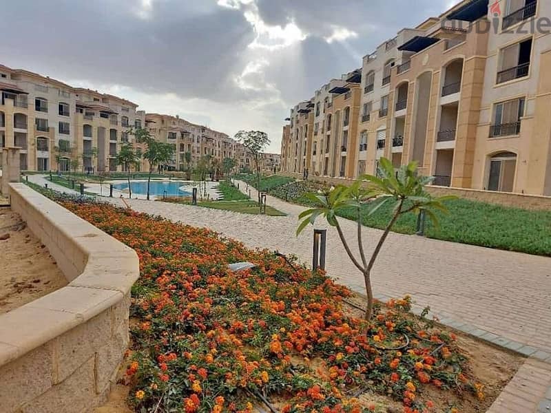 Apartment for sale, area of ​​205 meters + private garden, 111 meters, in New Cairo, in installments 7