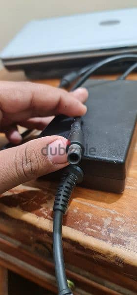 dell original charger for 1500 e. g 1