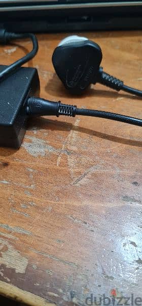 dell original charger for 1500 e. g 2