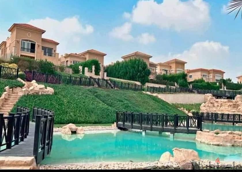 A distinctive villa for sale in installments with the largest landscape and gardens in the Fifth Settlement Telal Compound 10