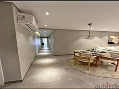 3-bedroom apartment, finished, with air conditioners and kitchen cabinets, for sale in the first towers in the Fifth Settlement, minutes from the AUC