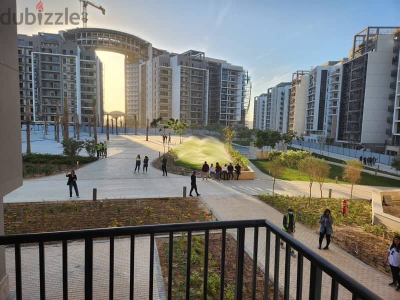 3-bedroom apartment, finished, with air conditioners and kitchen cabinets, for sale in the first towers in the Fifth Settlement, minutes from the AUC 8