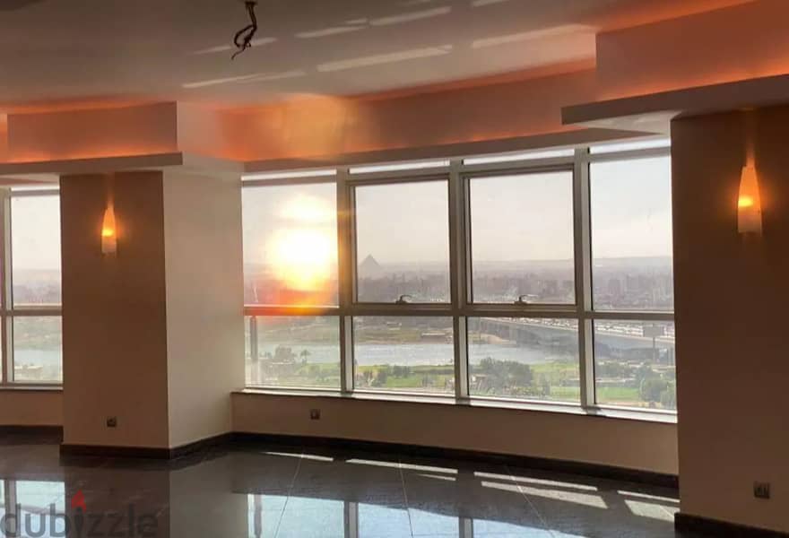 Apartment 430 m on the Nile under the supervision of Hilton Maadi, immediate receipt with luxurious finishing + air conditioners on the 18th floor, pa 2