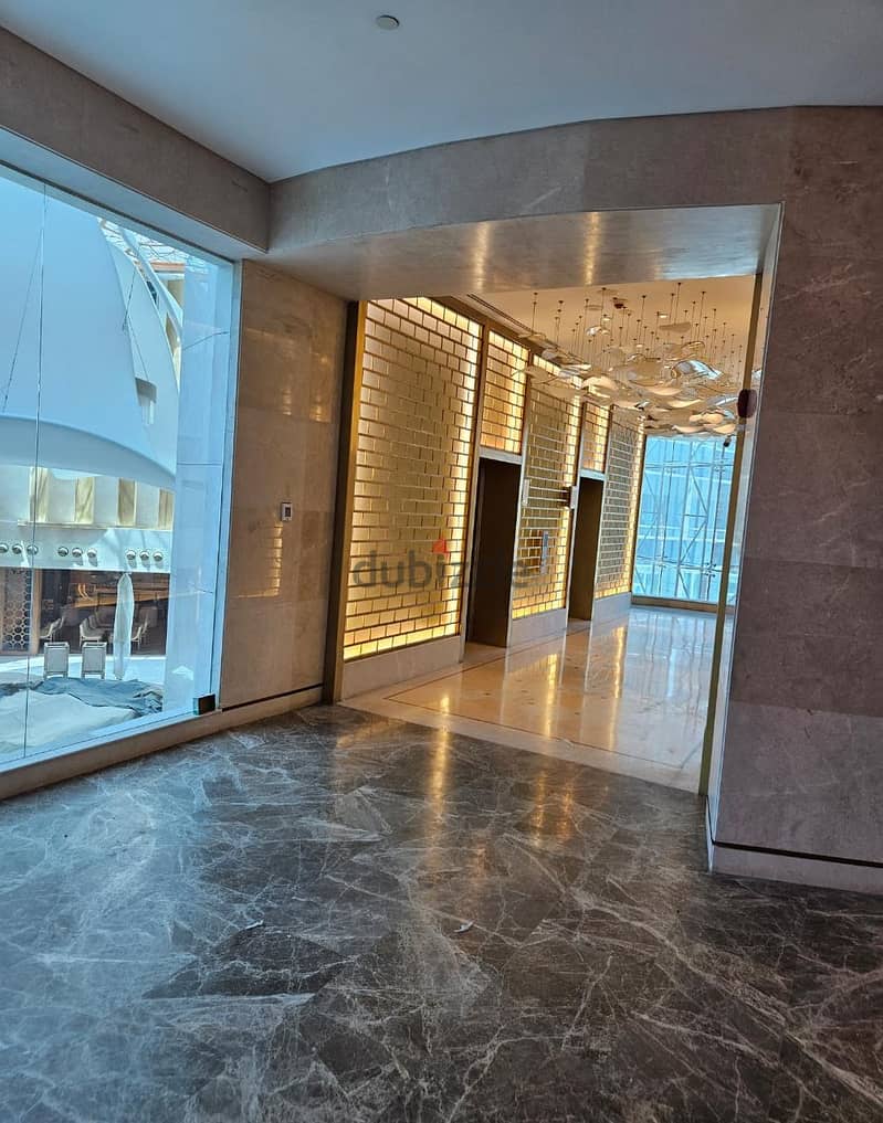 Apartment 430 m on the Nile under the supervision of Hilton Maadi, immediate receipt with luxurious finishing + air conditioners on the 18th floor, pa 11
