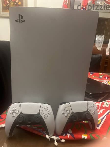 ps5 and 2 controllers 1
