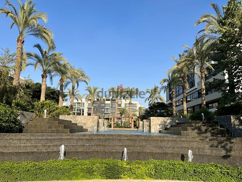 With the lowest down payment, invest or live in the most prestigious compound in the Fifth Settlement, Water Way - an apartment with a garden for sale 1