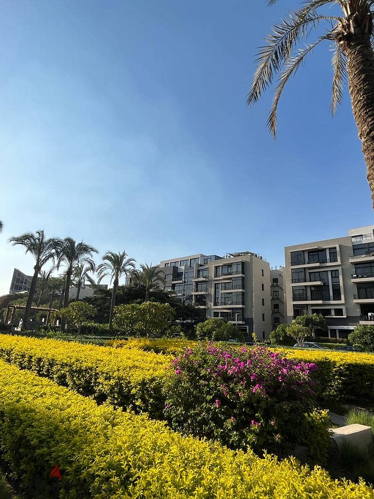 With the lowest down payment, invest or live in the most prestigious compound in the Fifth Settlement, Water Way - an apartment with a garden for sale 4