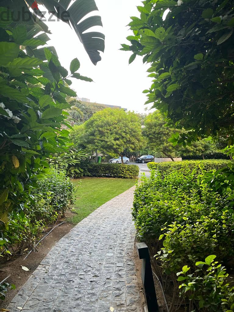 With the lowest down payment, invest or live in the most prestigious compound in the Fifth Settlement, Water Way - an apartment with a garden for sale 6