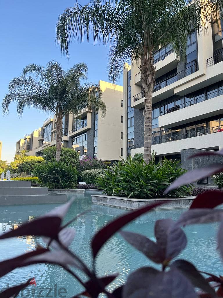 With the lowest down payment, invest or live in the most prestigious compound in the Fifth Settlement, Water Way - an apartment with a garden for sale 7